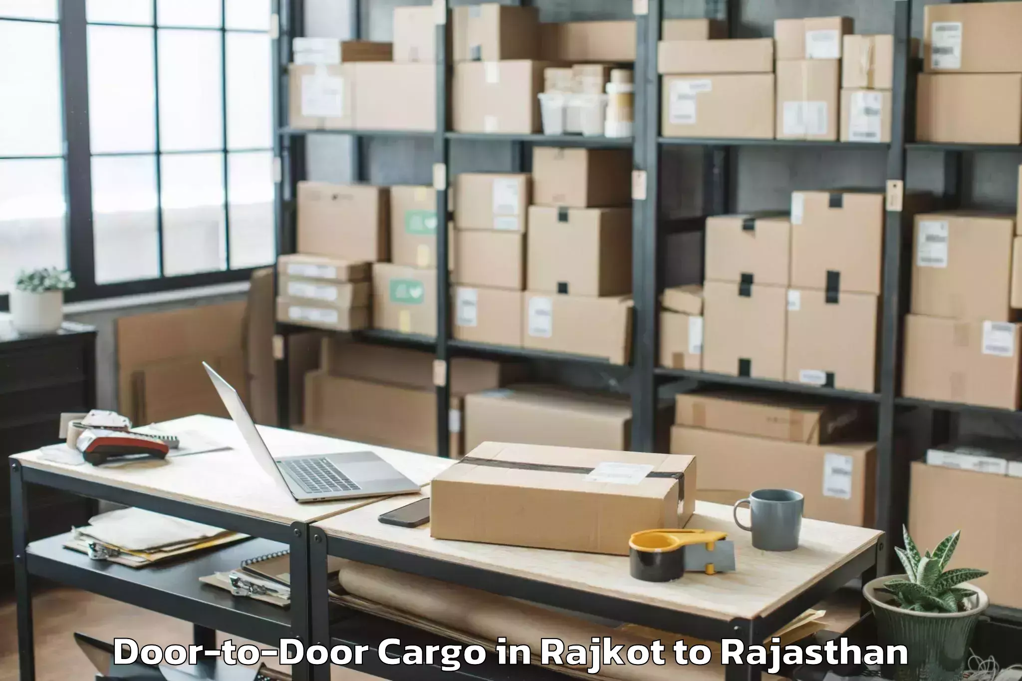 Easy Rajkot to Chauth Ka Barwara Door To Door Cargo Booking